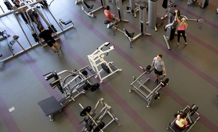 Students working out in the rec center weight room